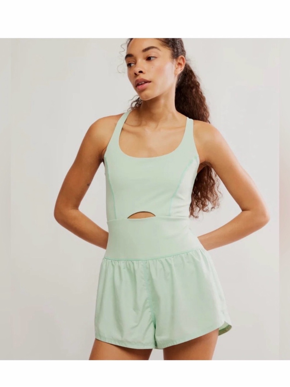 Free People Movement Mint Green Runsie Romper with Waist Cutout NWOT
